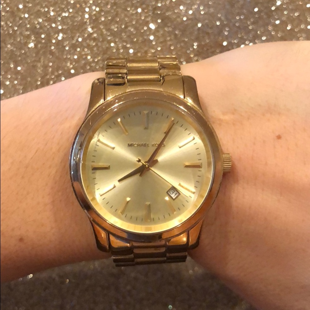 Women’s Michael Kors gold watch